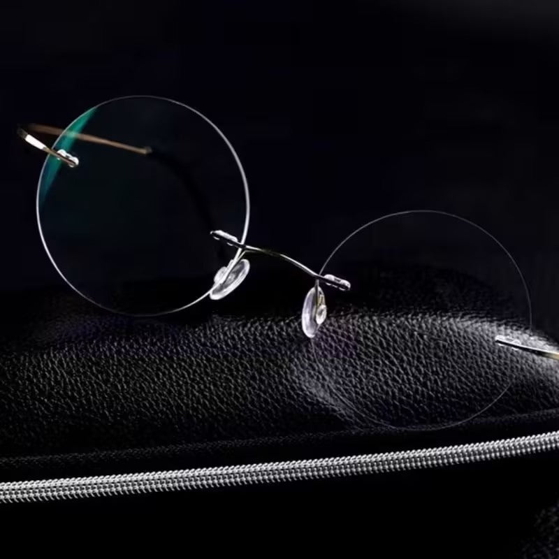 Ultra-Lightweight Retro Round Frameless Titanium Glasses